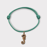 CHARMED bracelet with sea horse pendant