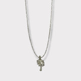 CHARMED steel necklace with palm tree pendant