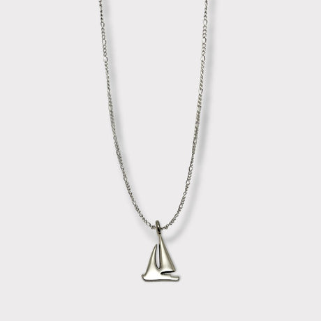 CHARMED titanium steel necklace with sailing yacht pendant