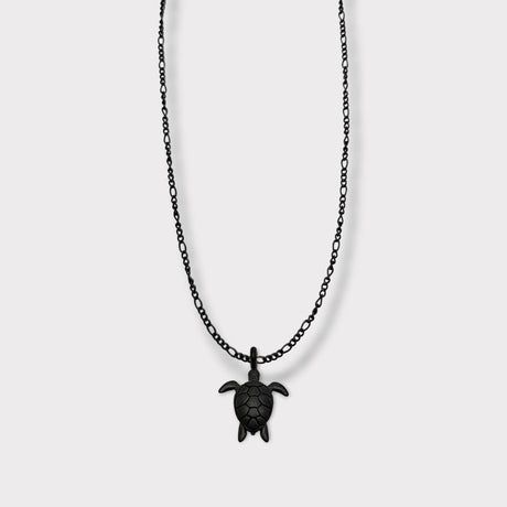 CHARMED titanium steel necklace with sea turtle pendant